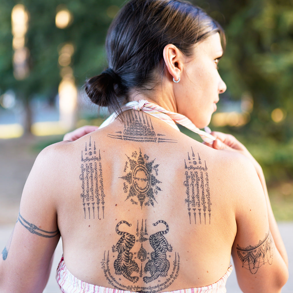 Female sak yant tattoo